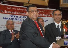 Prof. K Madan being awarded by Hon'ble Chief Justice of India