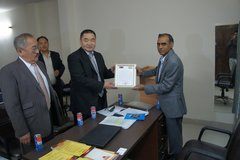 Prof Madan DLA receiving award from Mongolian Embassy